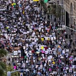 “He’s A Lunatic”: Thousands Of ‘Hands Off’ Protesters Rally Against Donald Trump Across US
