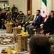 2024-12-24T141456Z_87756863_RC2PVBAM3SKD_RTRMADP_3_SYRIA-SECURITY-FACTIONS-MERGE
